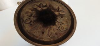 Antiguo candelabro de bronce