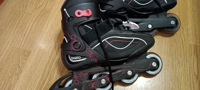patines con  protecciones y bolsa de transporte