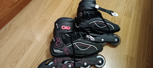 patines con  protecciones y bolsa de transporte