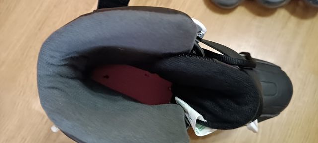 patines con  protecciones y bolsa de transporte