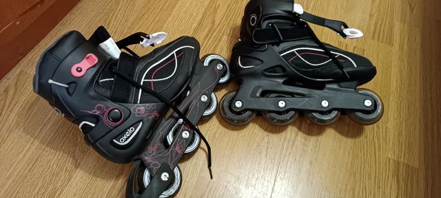 patines con  protecciones y bolsa de transporte