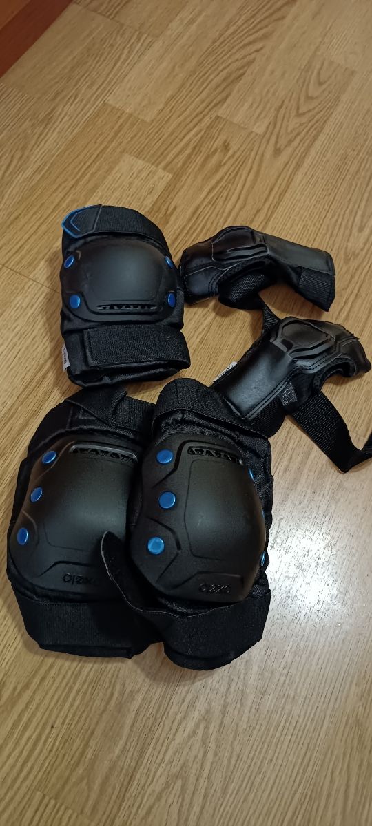 patines con  protecciones y bolsa de transporte