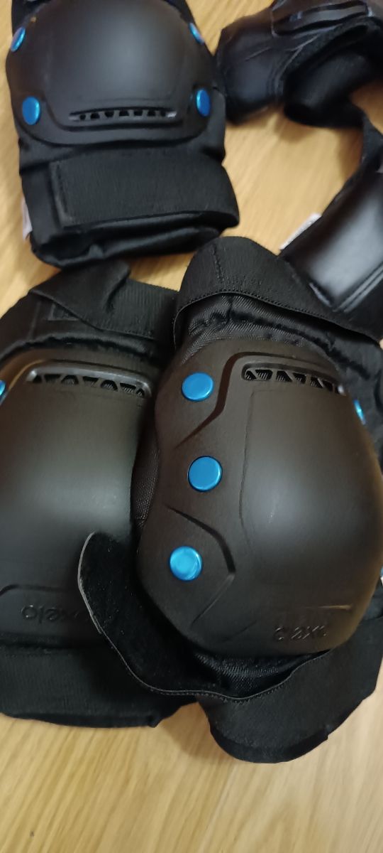 patines con  protecciones y bolsa de transporte