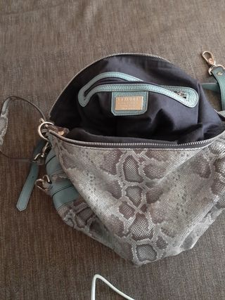 bolso mochila marca Claudia 