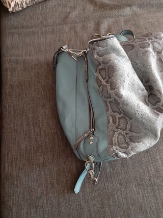 bolso mochila marca Claudia 
