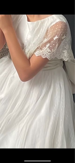 Dos trajes de comunión se venden por separado