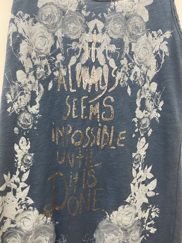 Canotta azzurra con scritta argento tg S