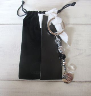 Llavero charm Guerlain