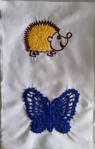 ricamo su teletta - riccio e farfalla