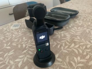 DJI Osmo Pocket + estuche +  funda + base-soporte