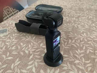 DJI Osmo Pocket + estuche +  funda + base-soporte