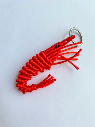 Llavero / accesorio bolso gamba