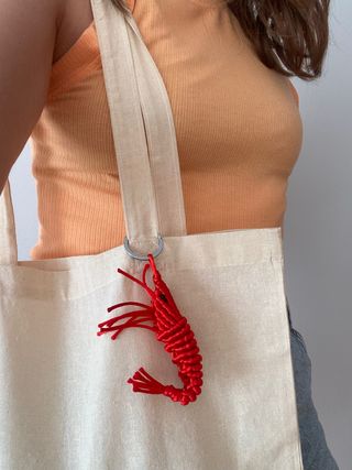 Llavero / accesorio bolso gamba