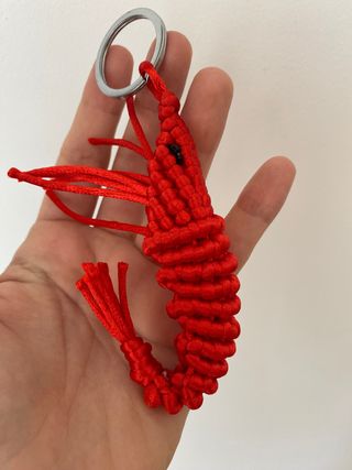 Llavero / accesorio bolso gamba