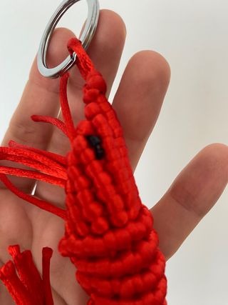 Llavero / accesorio bolso gamba