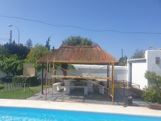 se hacen sombrillas de brezo. esparto.mimbre. ect