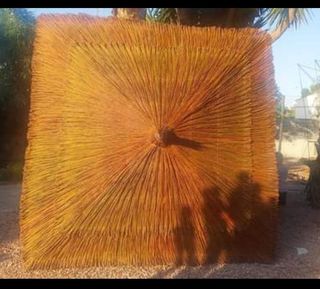 se hacen sombrillas de brezo. esparto.mimbre. ect