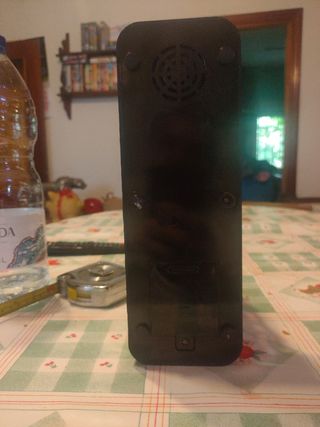 Moto radio FM y reloj despertador 