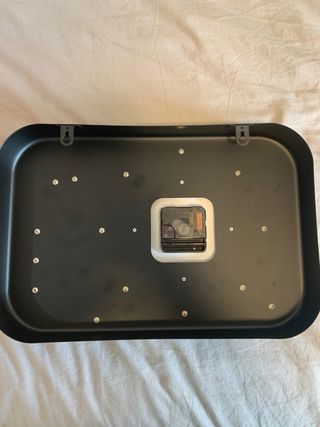 Reloj de pared con diseño de tocadiscos