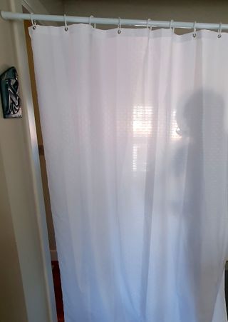 Barra de cortina de baño y cortinas de baño