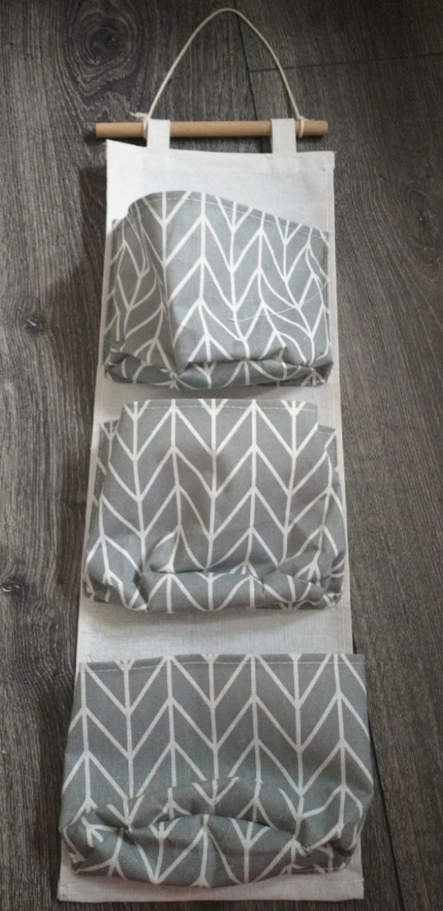 Appendino grigio con tasche