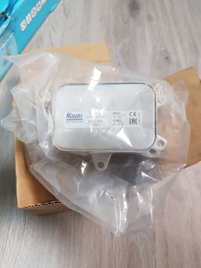 Enfriador de aceite Nissens 90966 / 9804281280