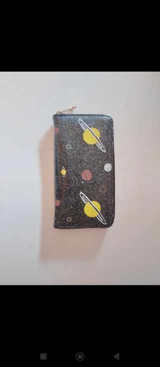 Monedero con estando del espacio 