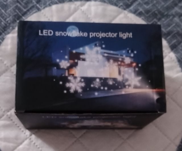 Proyector luz copos de nieve.