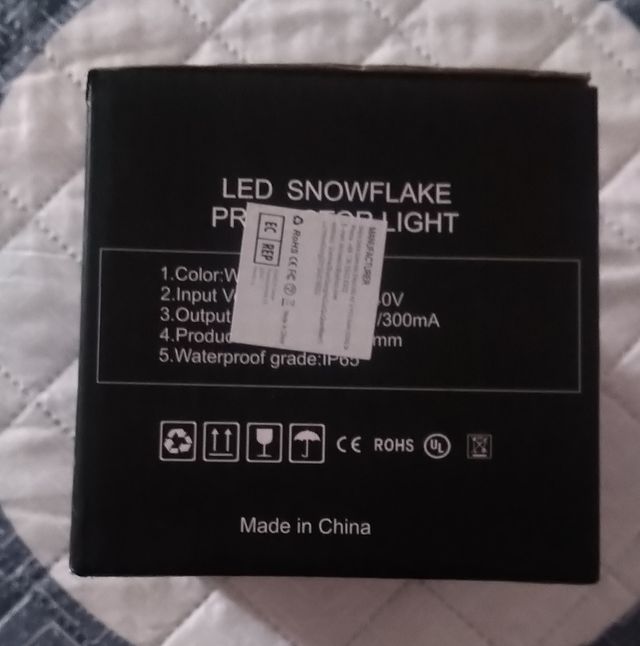 Proyector luz copos de nieve.