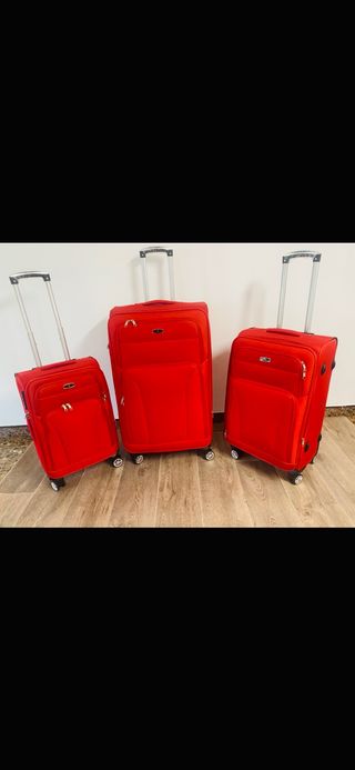 Set de tres  maletas de tela nuevas