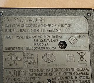cargador baterias Olympus camara de fotos