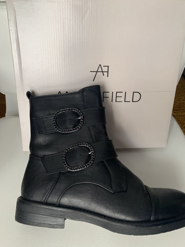 Botines negros de piel de invierno