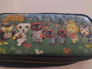 Nintendo nueva switch + juego + funda