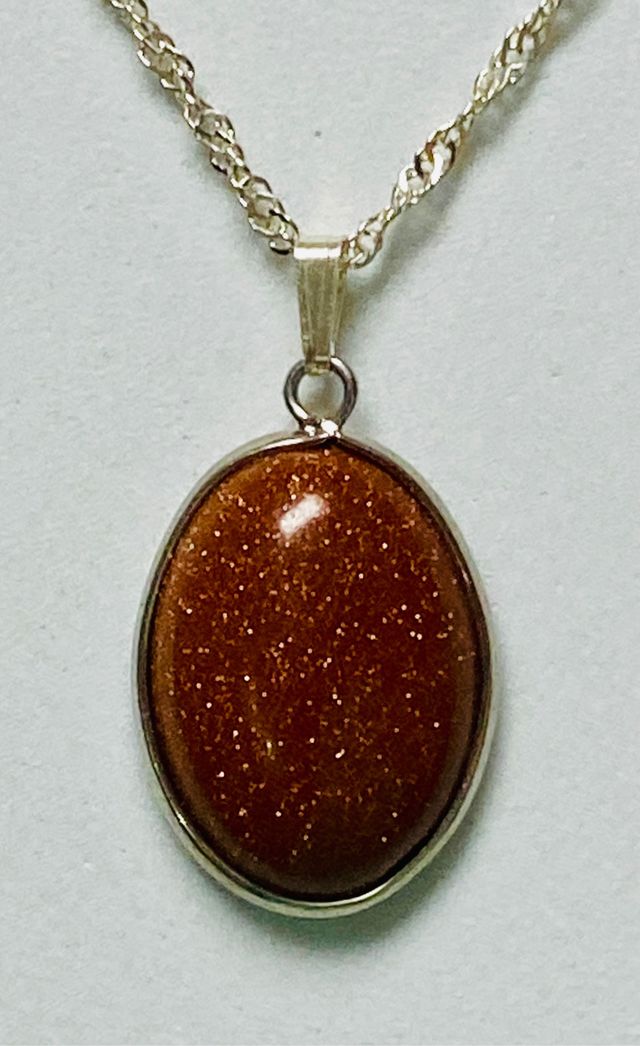 Colgante con aventurina oro y cadena plata ley 925