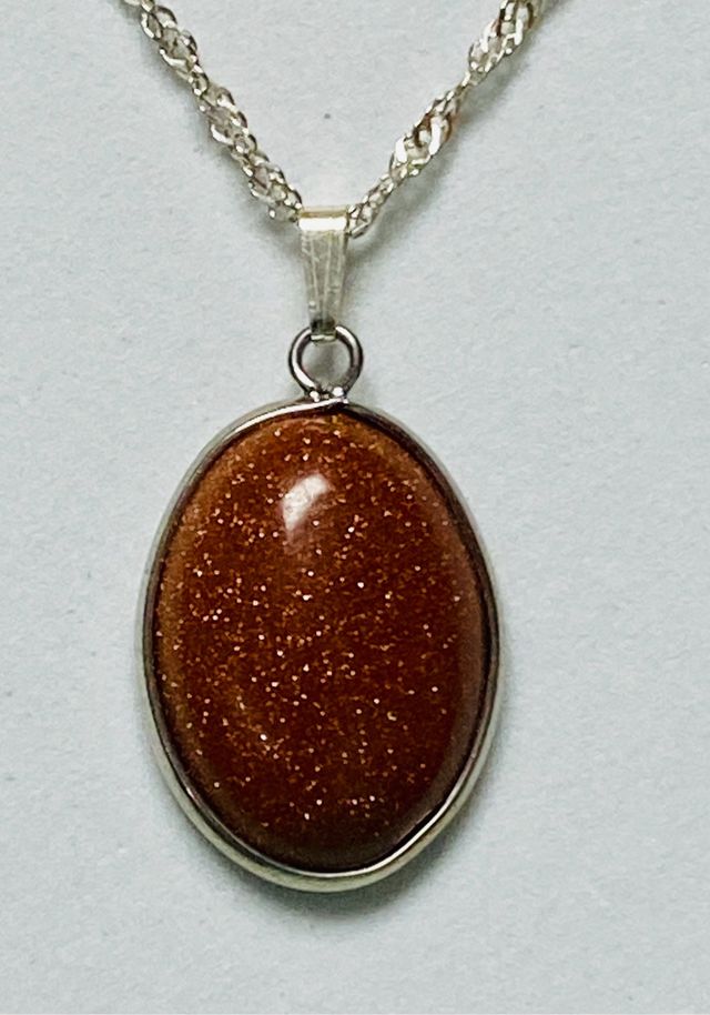 Colgante con aventurina oro y cadena plata ley 925