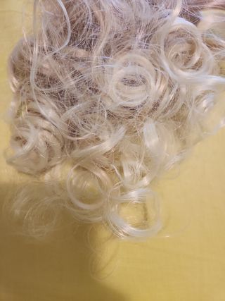 Extensiones rubias onduladas