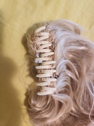 Extensiones rubias onduladas