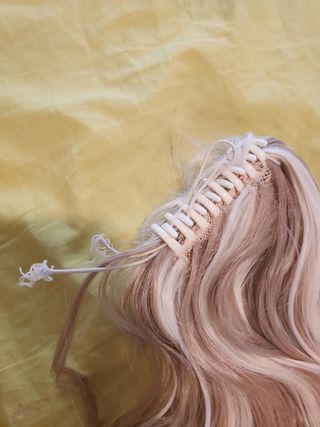 Extensiones rubias onduladas de pinza