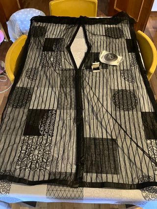 Mosquitera imantada en el centro