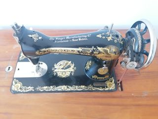 Máquina coser Singer con accesorios