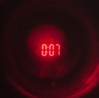 Radio despertador con proyector de hora