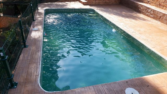 Impreso fachada piscinas