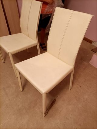 Sillas de cuero blancas