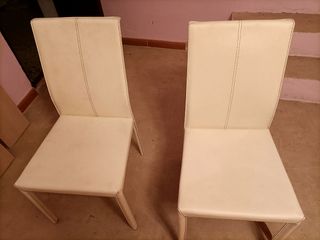 Sillas de cuero blancas