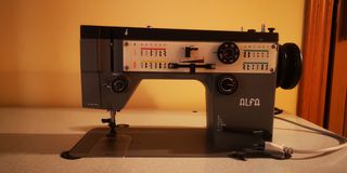 Máquina de coser alfa automática