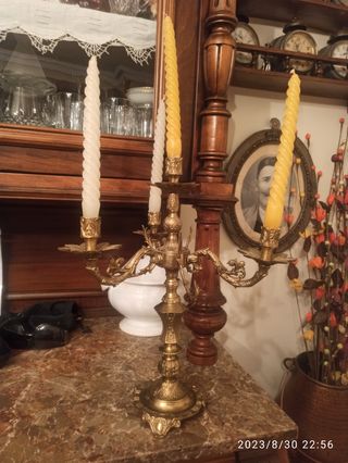 Candelabros en bronce y juego de dos en Cecerámica