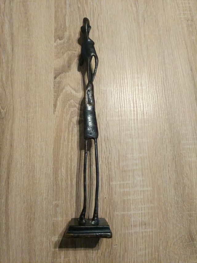 Figura hombre africano metal 
