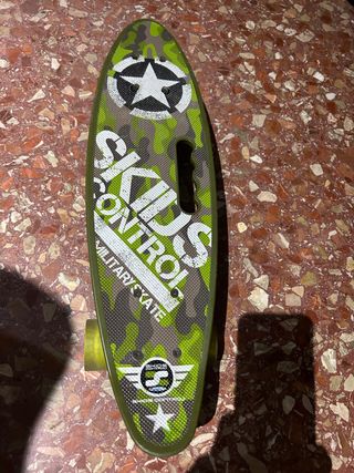 Monopatín con mango