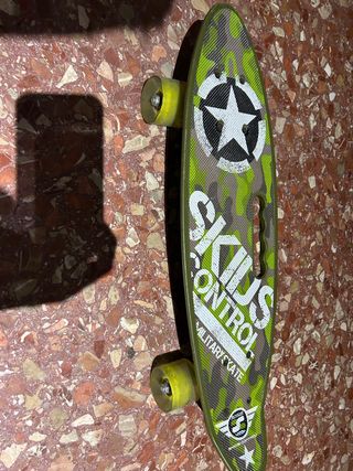 Monopatín con mango