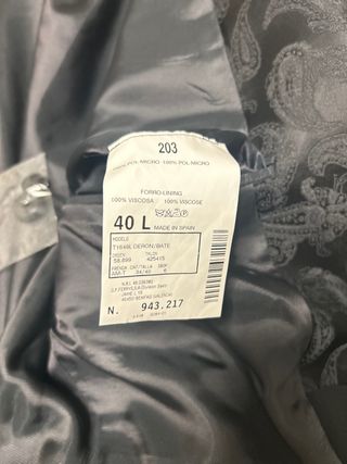 traje